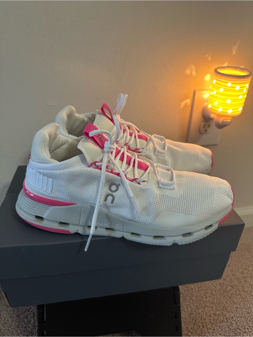 On Cloudnova 2, Women’s size 10 White and Pink Cloud-Style. Men’s 8.5